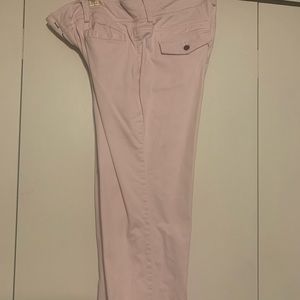 Light pink trousers.